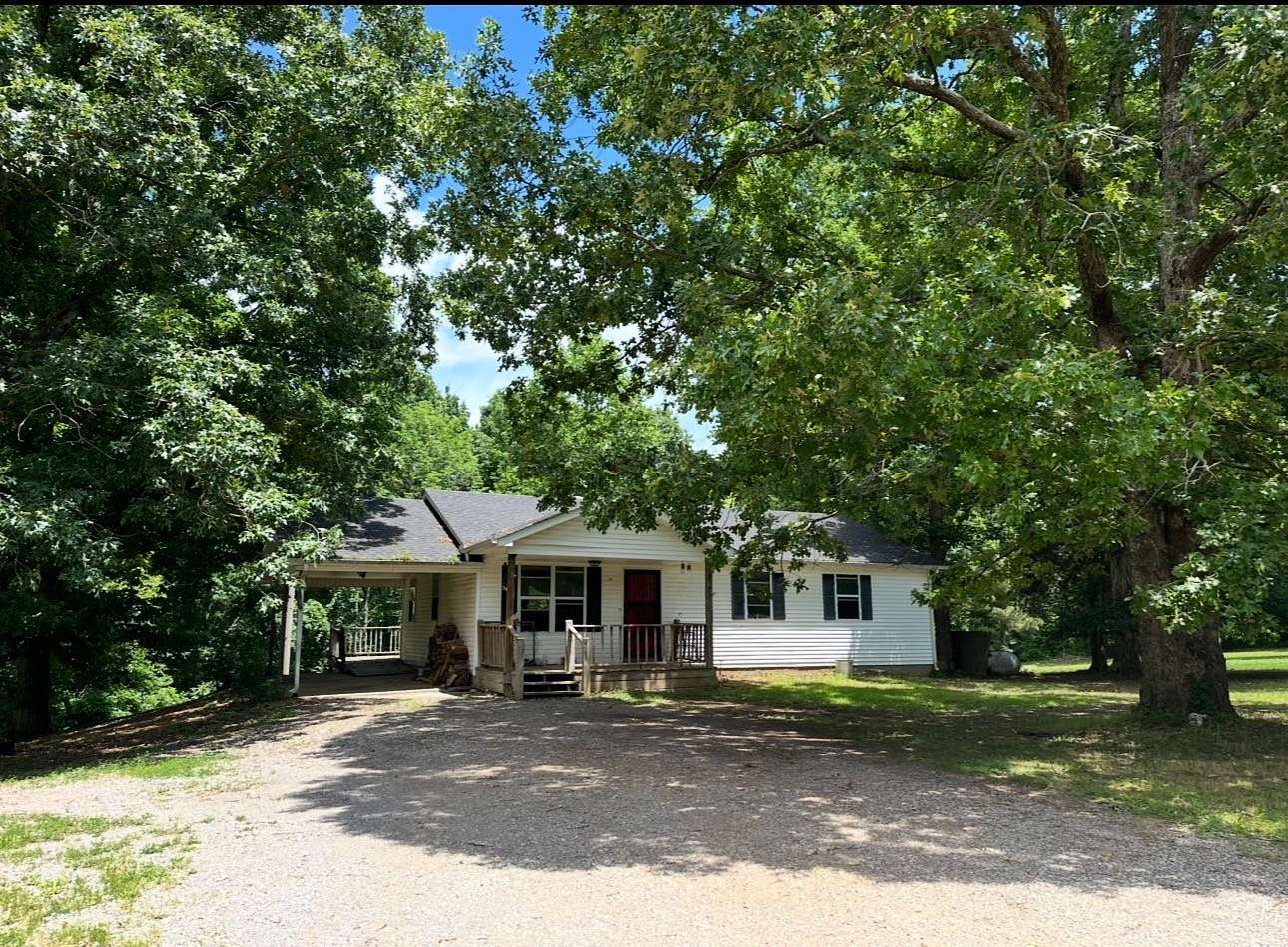 2 Acres of Land with Home for Sale in Tennessee Ridge, Tennessee
