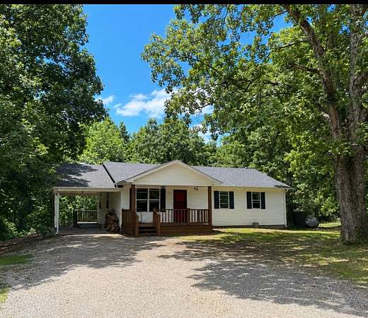 2 Acres of Land with Home for Sale in Tennessee Ridge, Tennessee