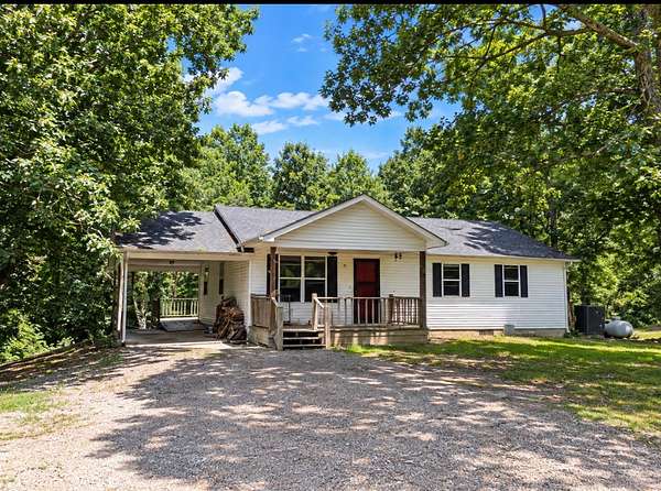 2 Acres of Land with Home for Sale in Tennessee Ridge, Tennessee