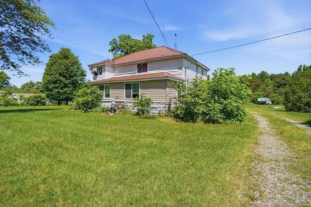 2 Acres of Land with Home for Sale in Montrose, Michigan