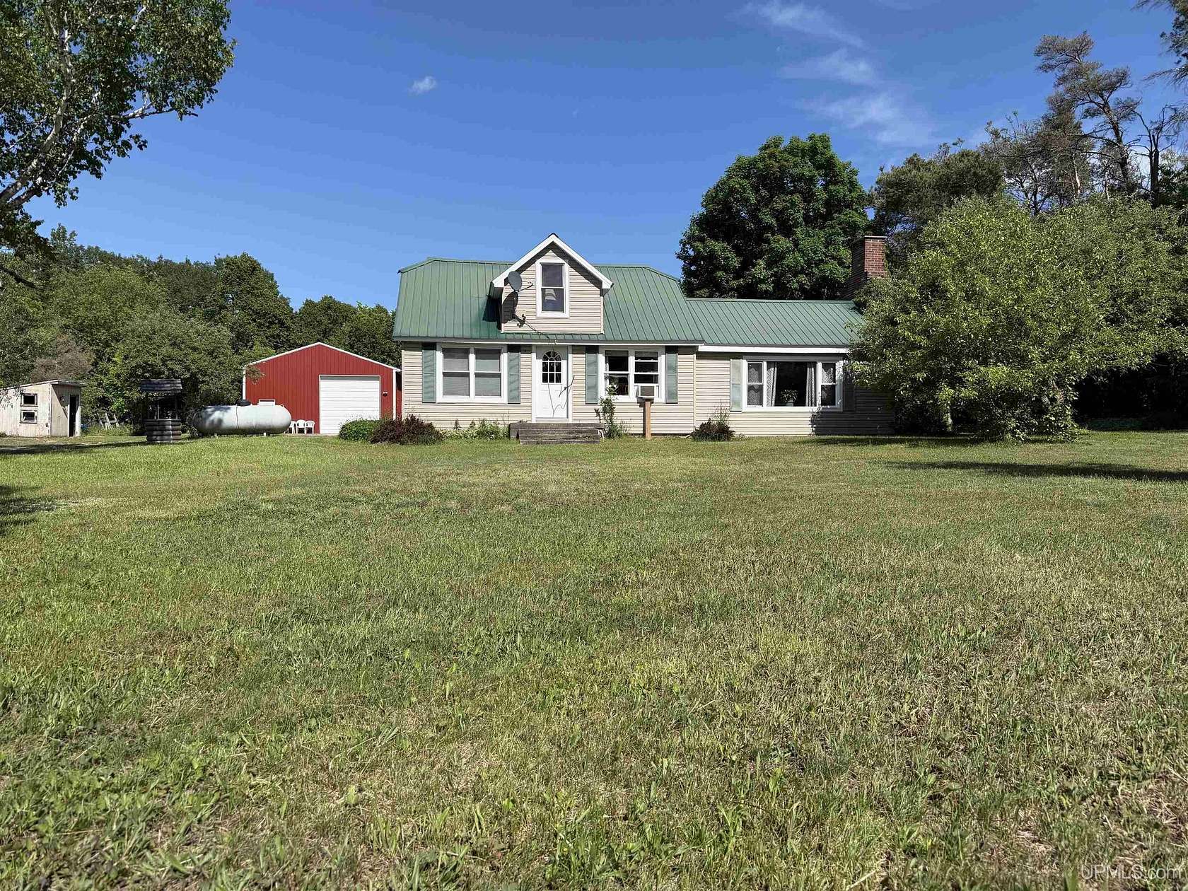 10 Acres of Recreational Land with Home for Sale in Gould City, Michigan