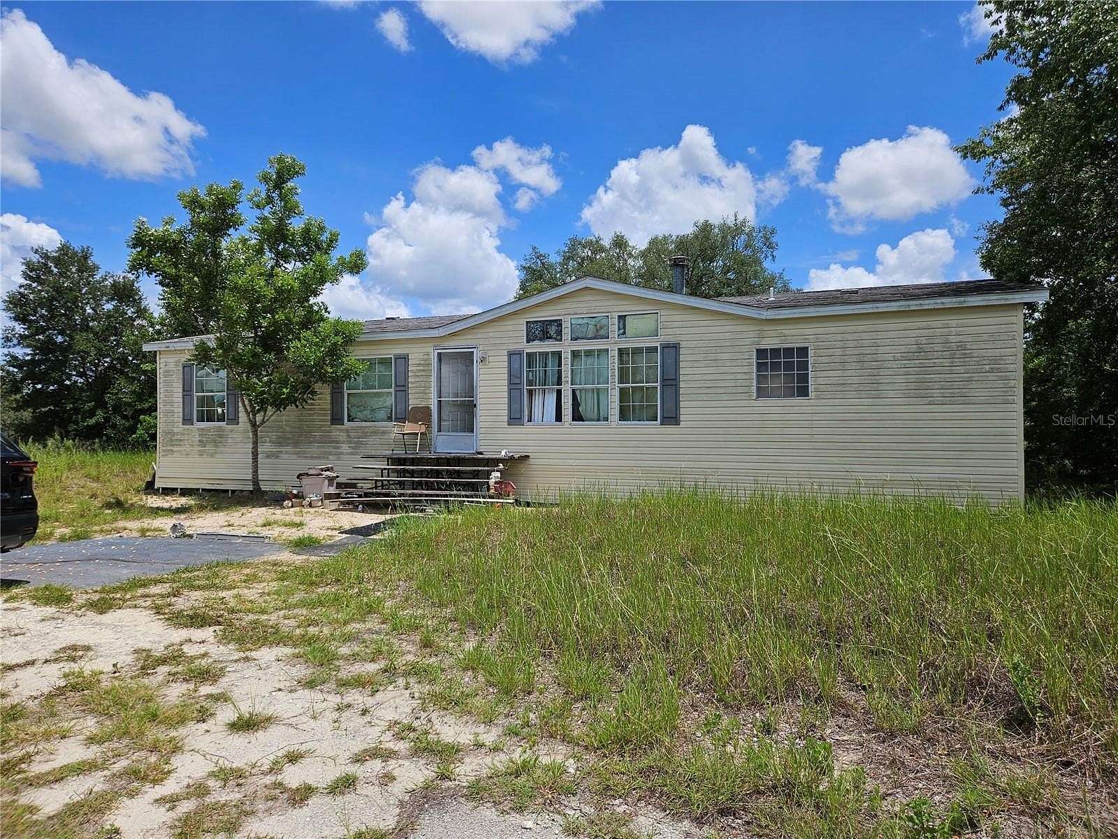 9.38 Acres of Land with Home for Sale in Dunnellon, Florida