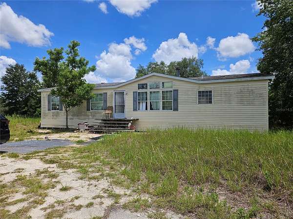 9.38 Acres of Land with Home for Sale in Dunnellon, Florida