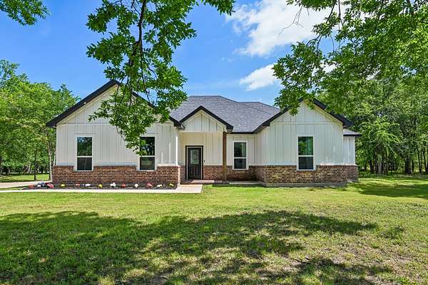 2.11 Acres of Land with Home for Sale in Quinlan, Texas