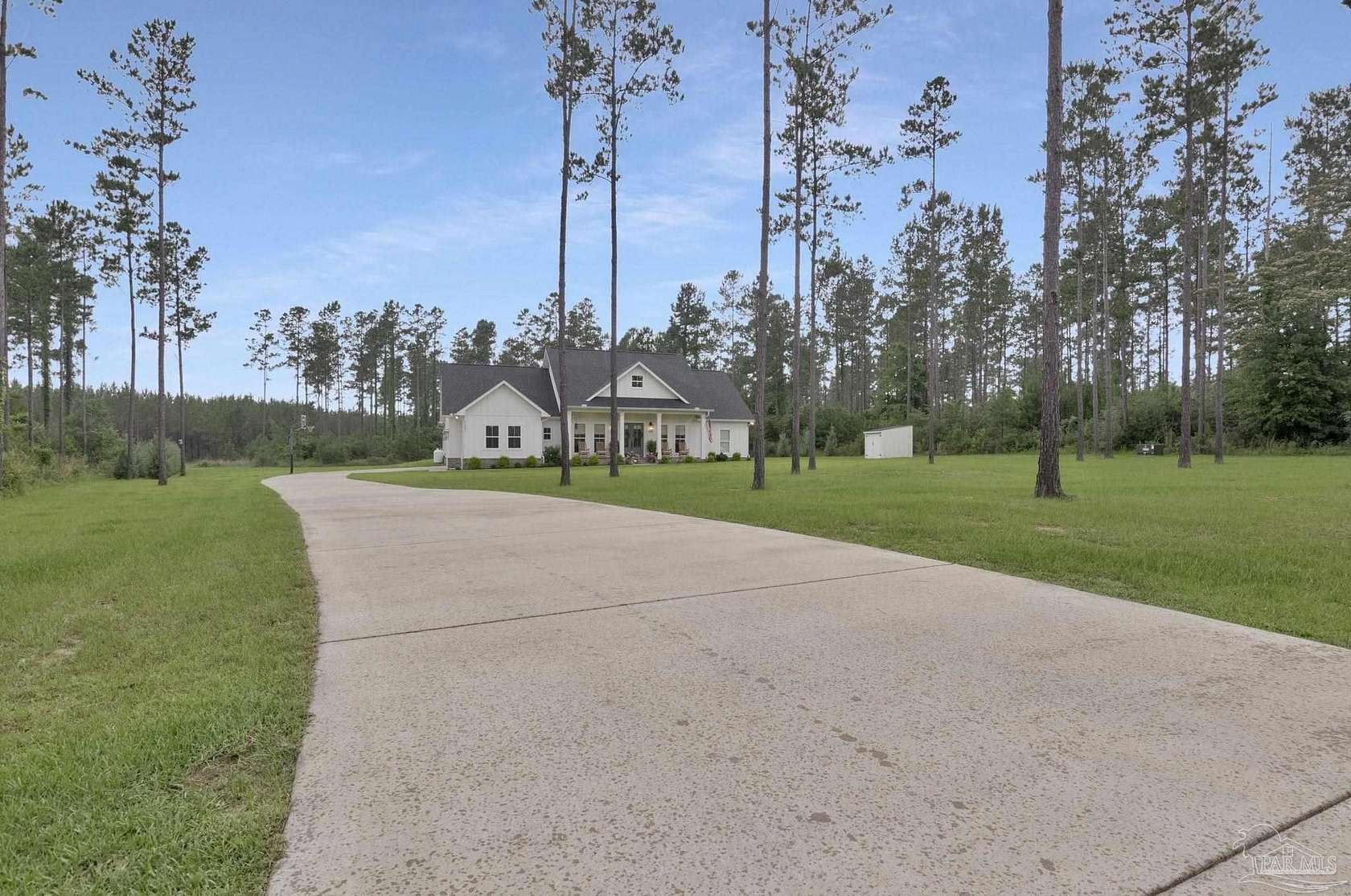 2.39 Acres of Land with Home for Sale in Pace, Florida