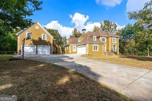2.5 Acres of Land with Home for Sale in Hampton, Georgia