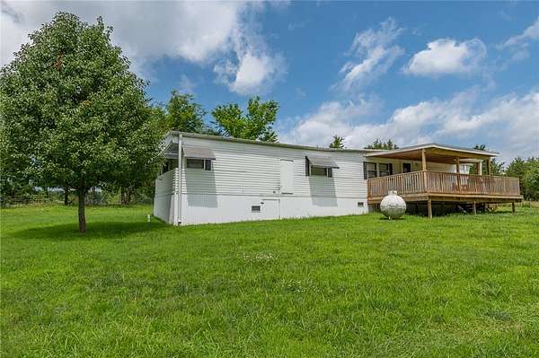 5.6 Acres of Land with Home for Sale in Yellville, Arkansas