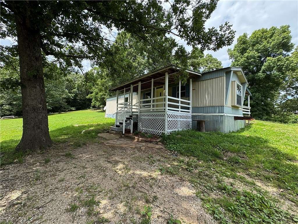 3.48 Acres of Land with Home for Sale in Marble Falls Township, Arkansas