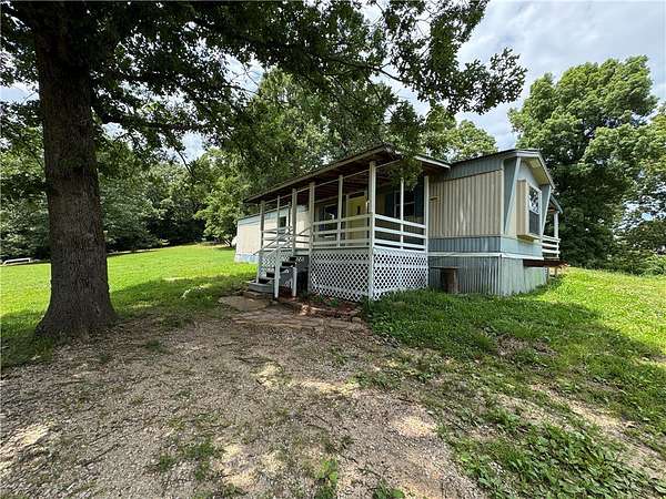 3.48 Acres of Land with Home for Sale in Marble Falls Township, Arkansas