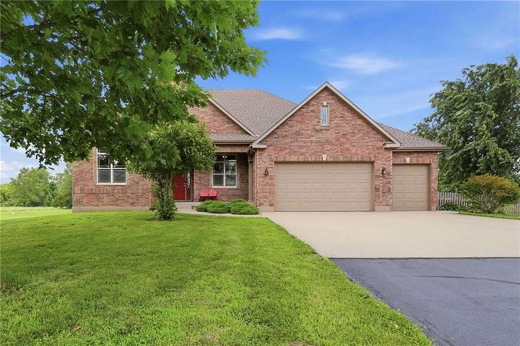 9.67 Acres of Land with Home for Sale in Buckner, Missouri