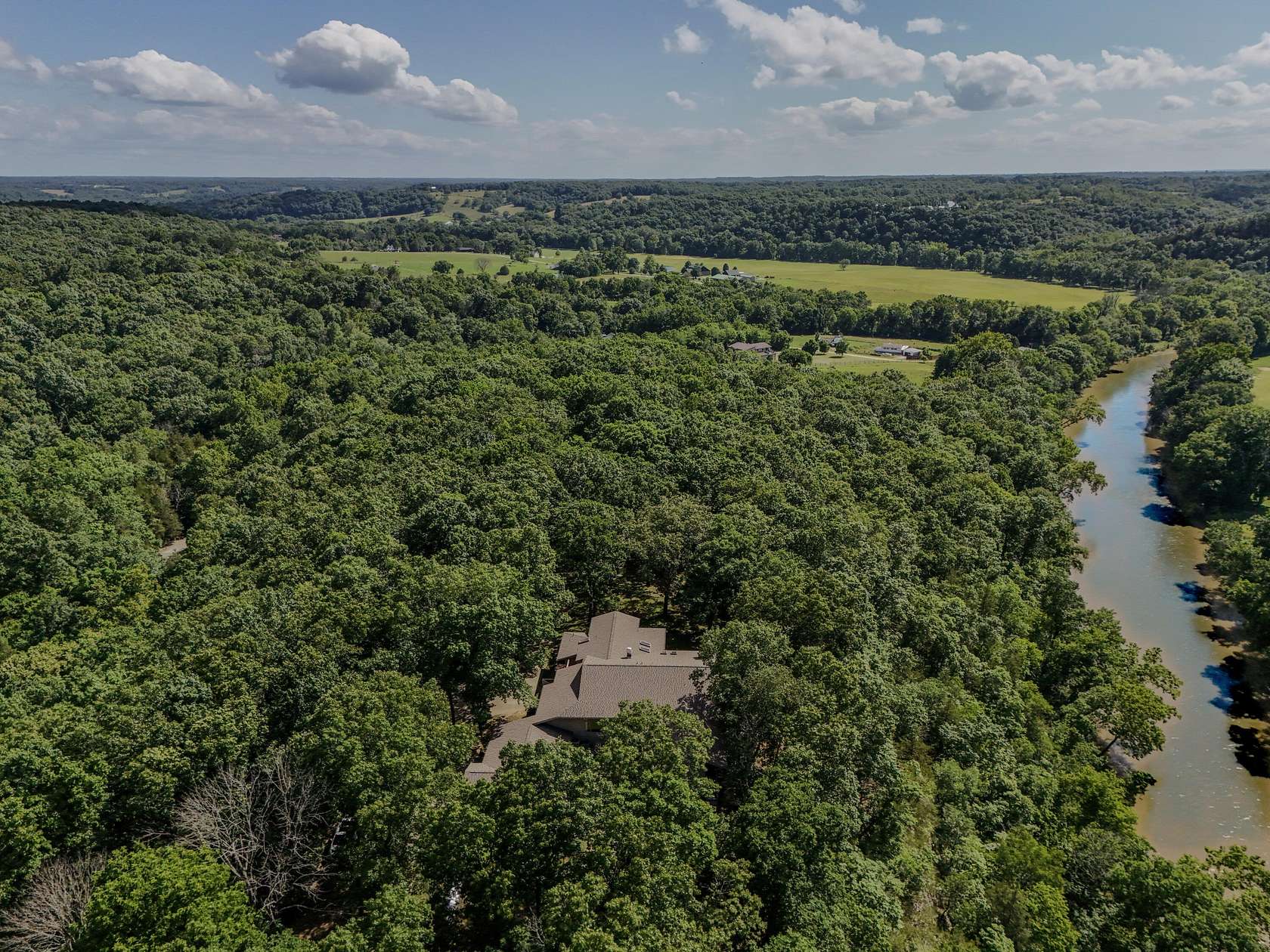 69.2 Acres of Land with Home for Sale in Nixa, Missouri