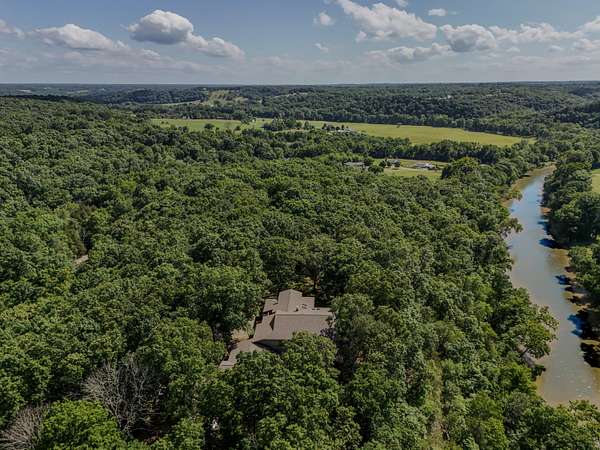 69.2 Acres of Land with Home for Sale in Nixa, Missouri