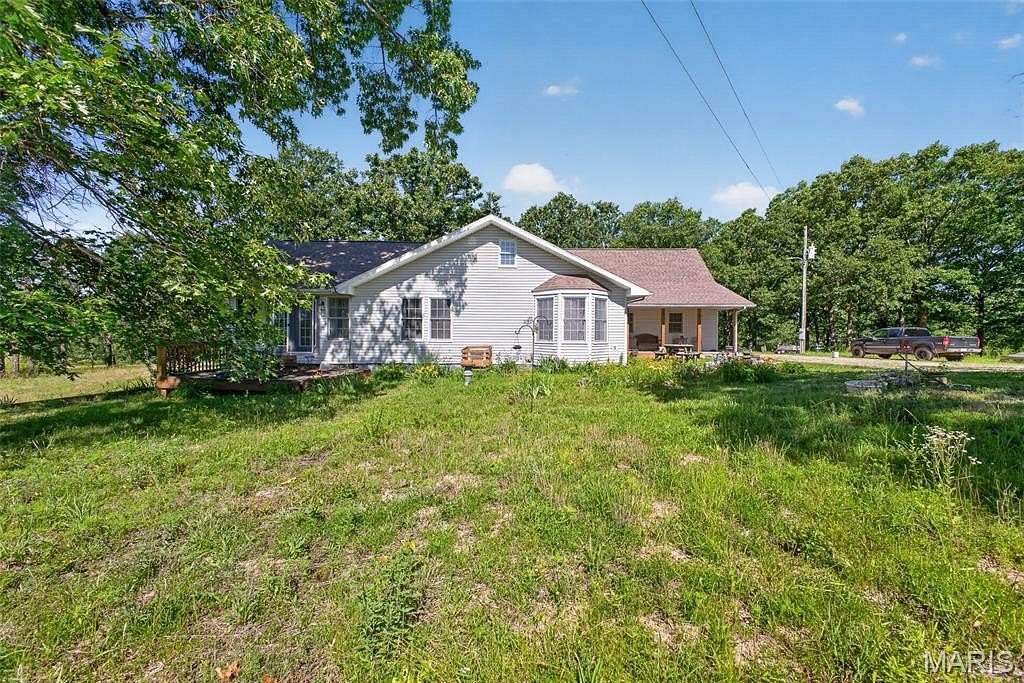 40 Acres of Land with Home for Sale in Lebanon, Missouri