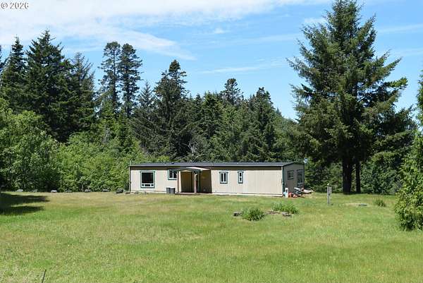 7.34 Acres of Land with Home for Sale in Gold Beach, Oregon