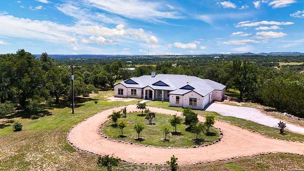7.42 Acres of Land with Home for Sale in Round Mountain, Texas