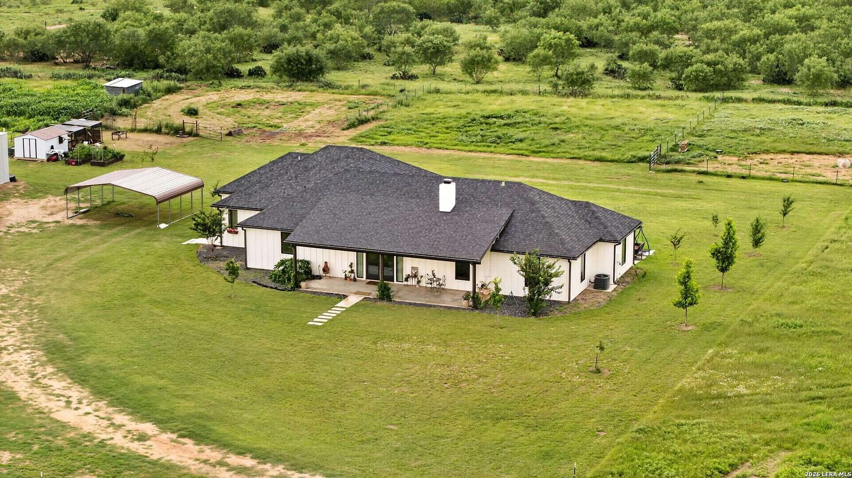 18.8 Acres of Land with Home for Sale in Devine, Texas