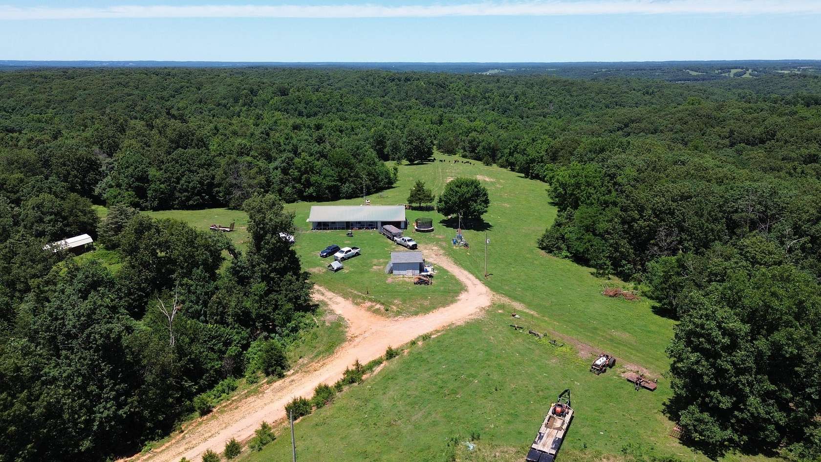 83.2 Acres of Land with Home for Sale in Southwest City, Missouri