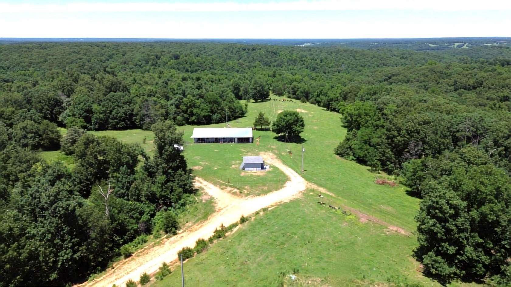 83.2 Acres of Land with Home for Sale in Southwest City, Missouri