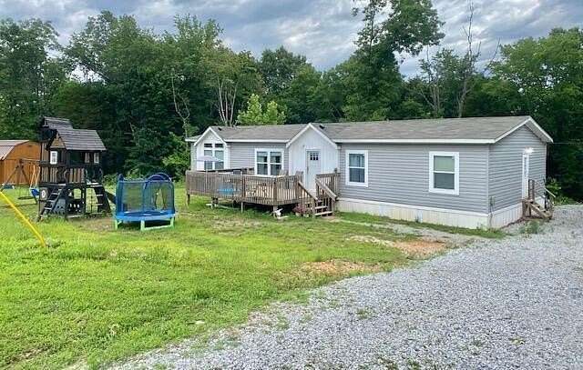 4.66 Acres of Land with Home for Sale in Anderson, Missouri