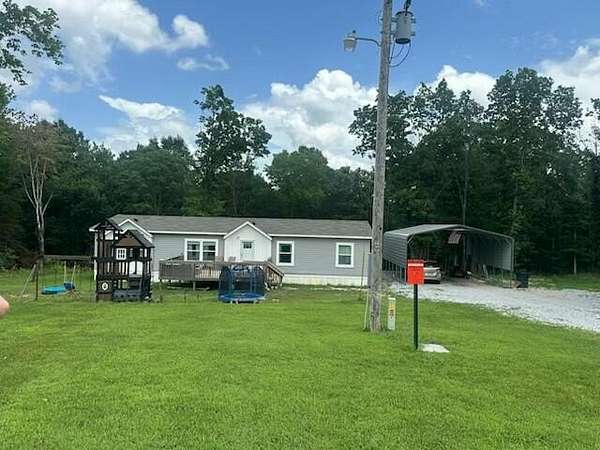 4.66 Acres of Land with Home for Sale in Anderson, Missouri