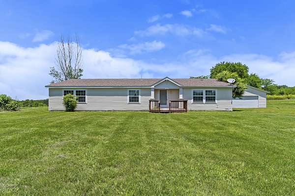 6.13 Acres of Land with Home for Sale in Strafford, Missouri