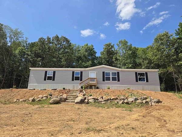 6.59 Acres of Land with Home for Sale in Perryville, Arkansas