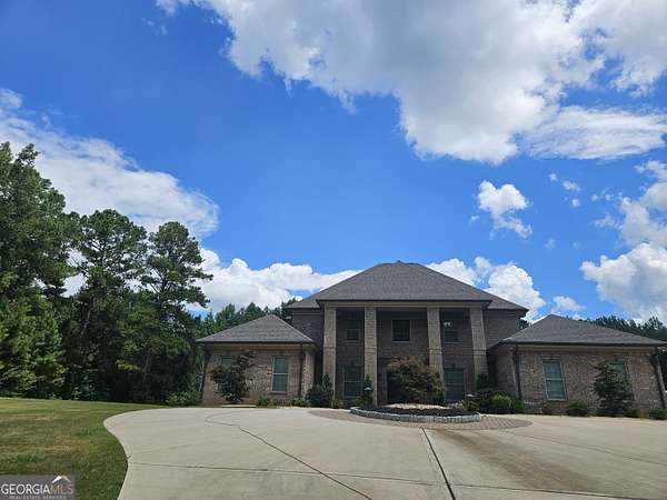 1.84 Acres of Land with Home for Lease in Fairburn, Georgia