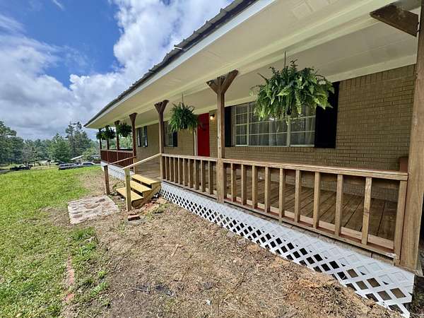 1.8 Acres of Land with Home for Sale in Blue Mountain, Mississippi