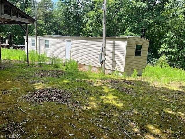 1.66 Acres of Land with Home for Sale in Franklinville, North Carolina