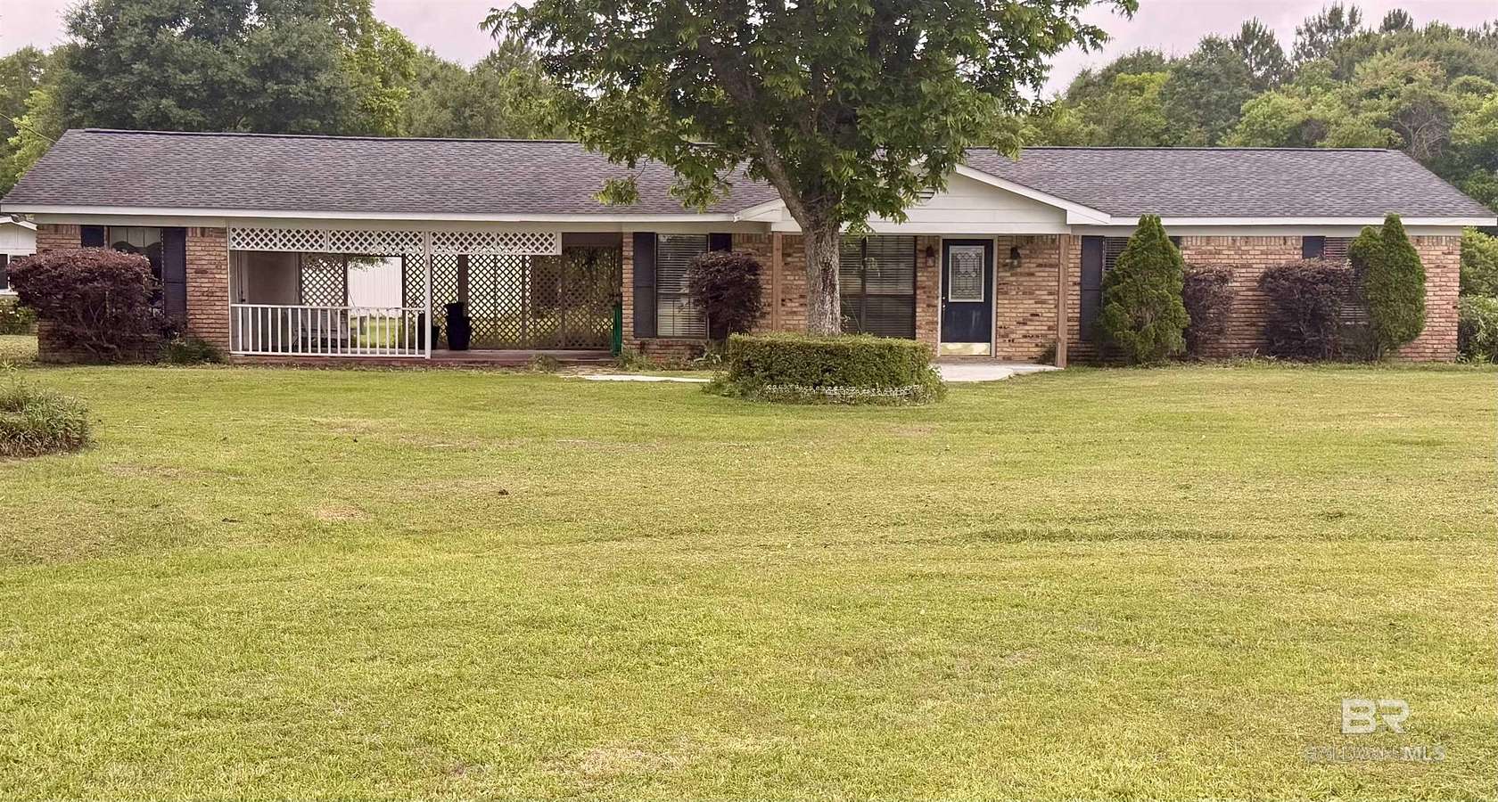9.6 Acres of Land with Home for Sale in Irvington, Alabama