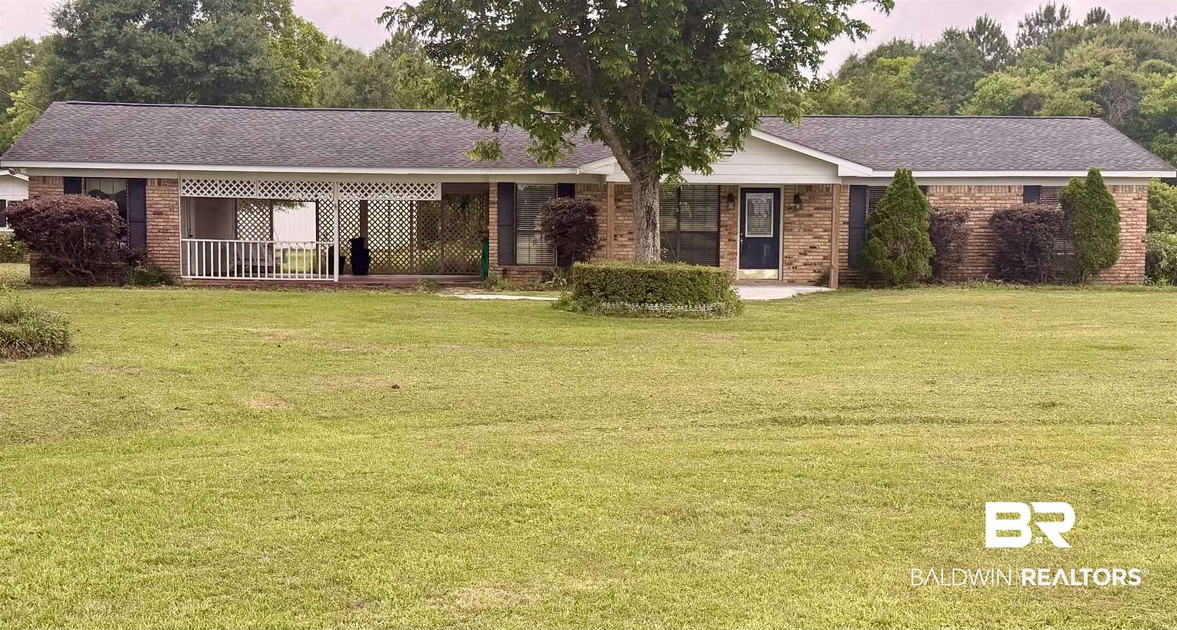 9.6 Acres of Land with Home for Sale in Irvington, Alabama