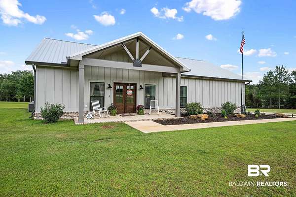 12.2 Acres of Land with Home for Sale in Robertsdale, Alabama