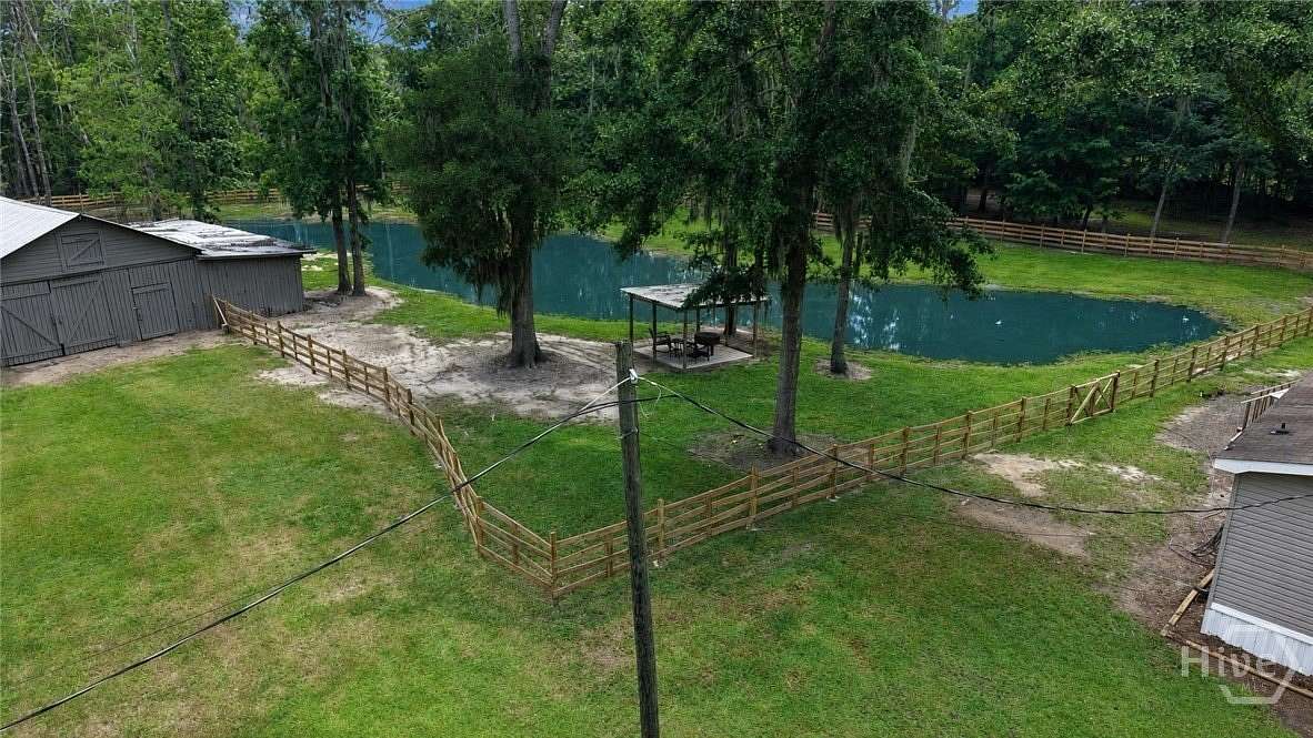 5.65 Acres of Land with Home for Sale in Riceboro, Georgia