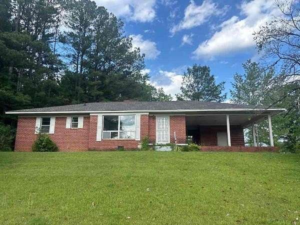 5.6 Acres of Land with Home for Sale in Fulton, Mississippi