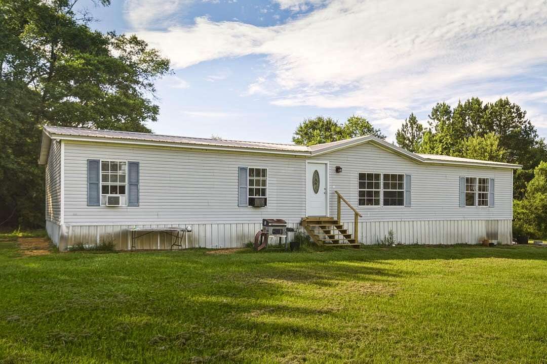 4.6 Acres of Land with Home for Sale in Foxworth, Mississippi