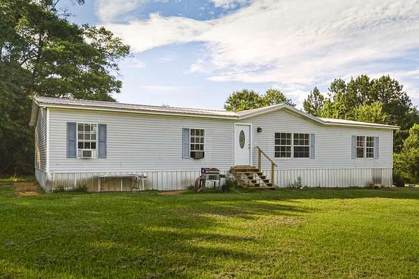 4.6 Acres of Land with Home for Sale in Foxworth, Mississippi