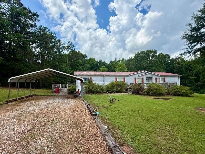 13 Acres of Land with Home for Sale in Walnut, Mississippi