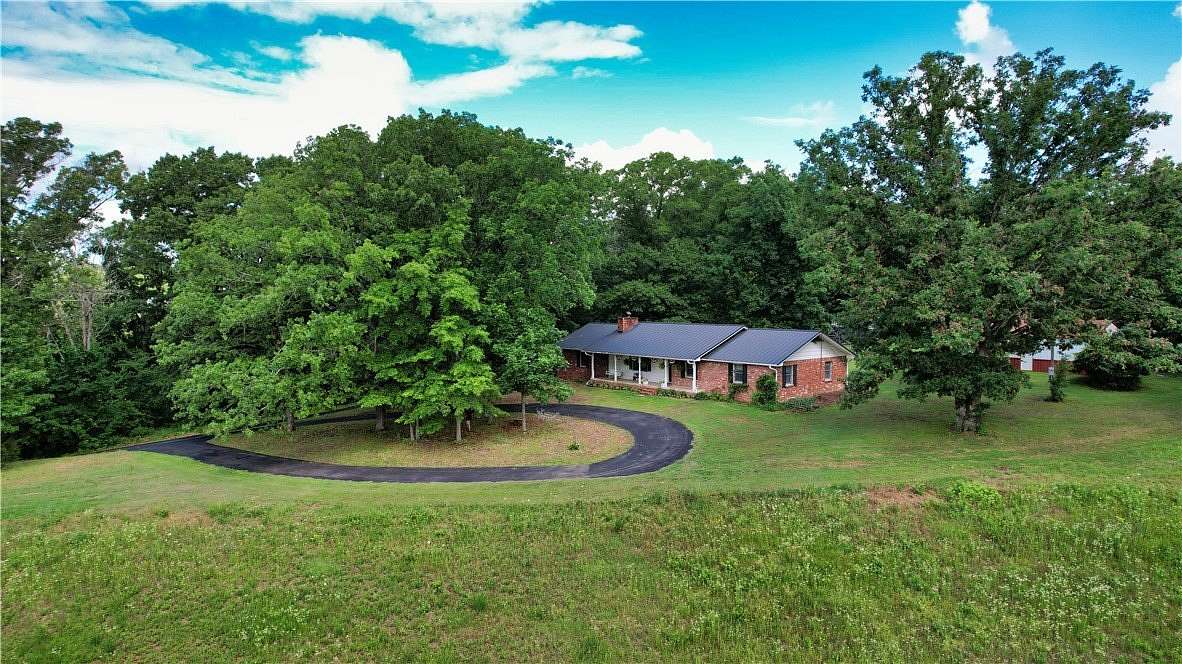 17.5 Acres of Land with Home for Sale in Rogers, Arkansas