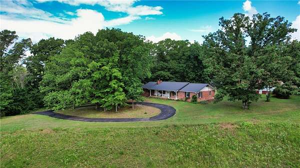 17.5 Acres of Land with Home for Sale in Rogers, Arkansas
