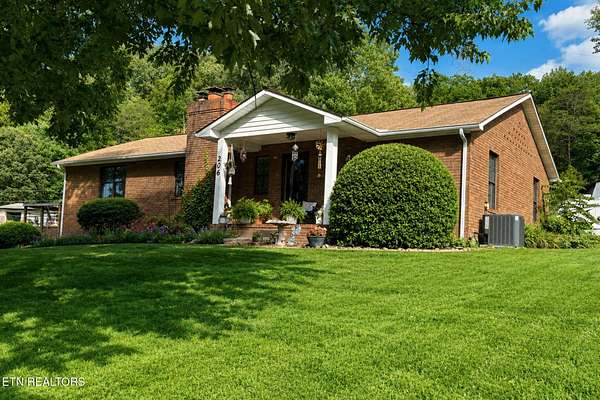 5.58 Acres of Land with Home for Sale in Powell, Tennessee