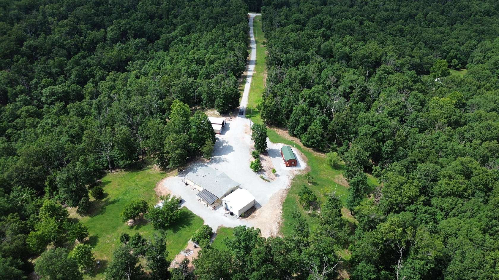 18.3 Acres of Land with Home for Sale in Wyandotte, Oklahoma