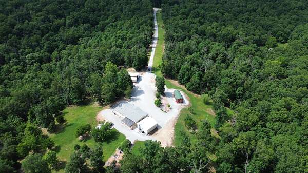 18.3 Acres of Land with Home for Sale in Wyandotte, Oklahoma