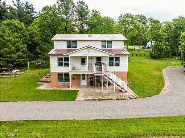 7.54 Acres of Land with Home for Auction in Fresno, Ohio