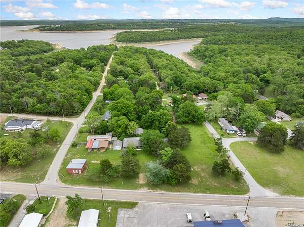 1.6 Acres of Land with Home for Sale in Diamond City, Arkansas
