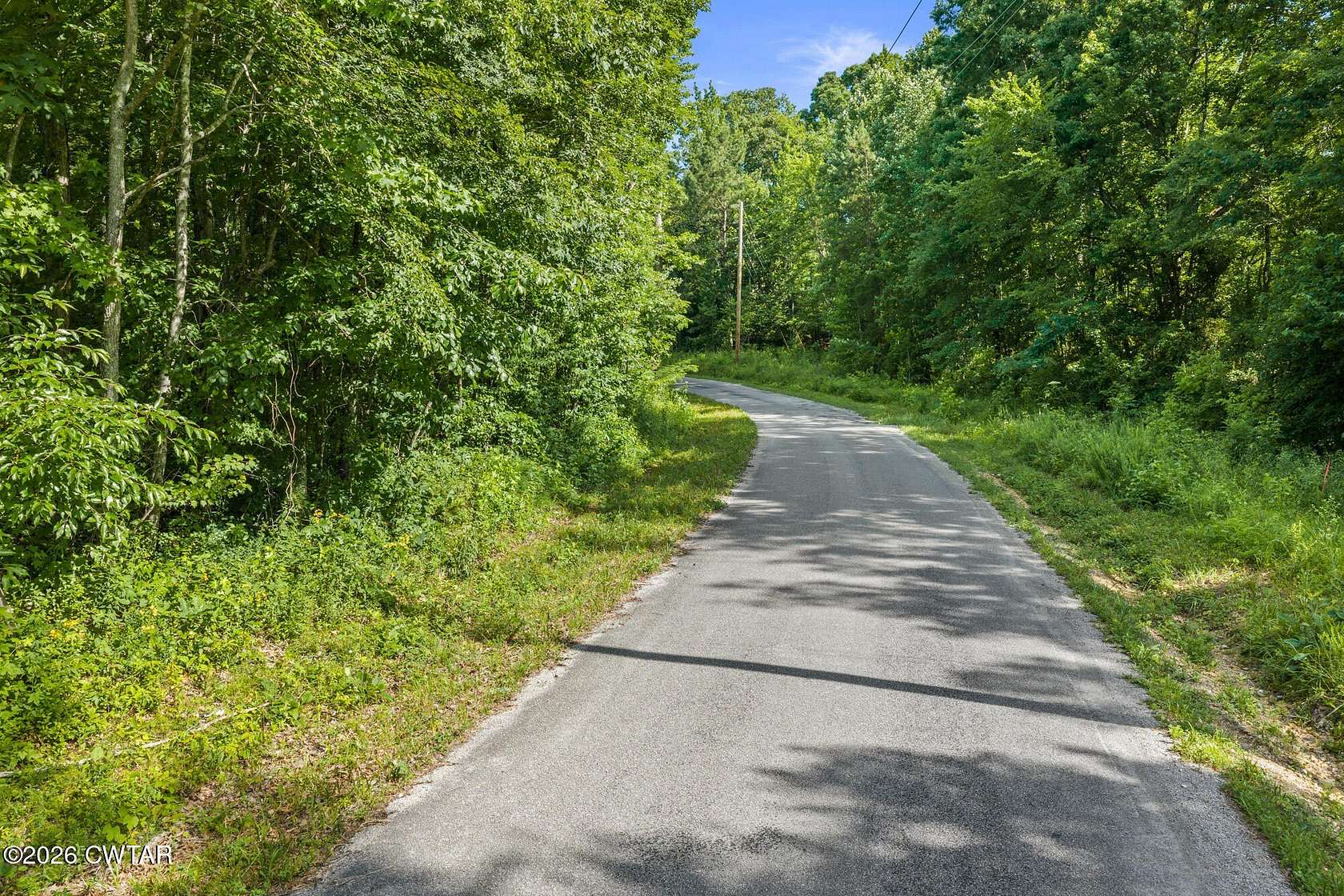 30 Acres of Recreational Land for Sale in Holladay, Tennessee
