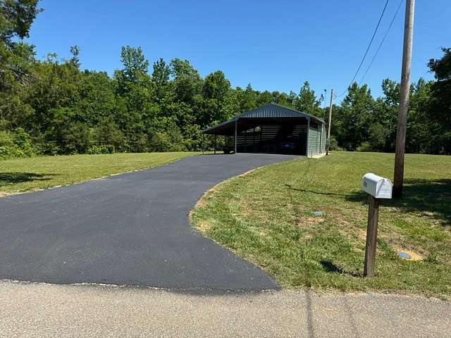 2 Acres of Land with Home for Sale in Linden, Tennessee