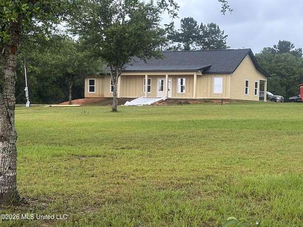 2 Acres of Land with Home for Sale in Kiln, Mississippi