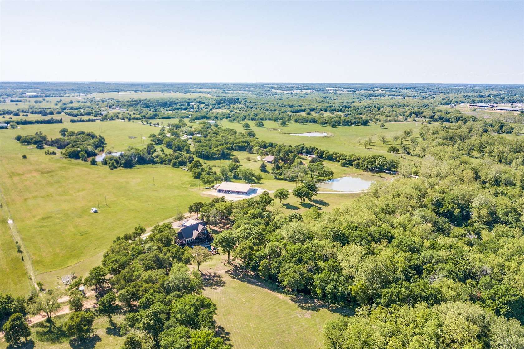 62 Acres of Recreational Land with Home for Sale in Whitesboro, Texas