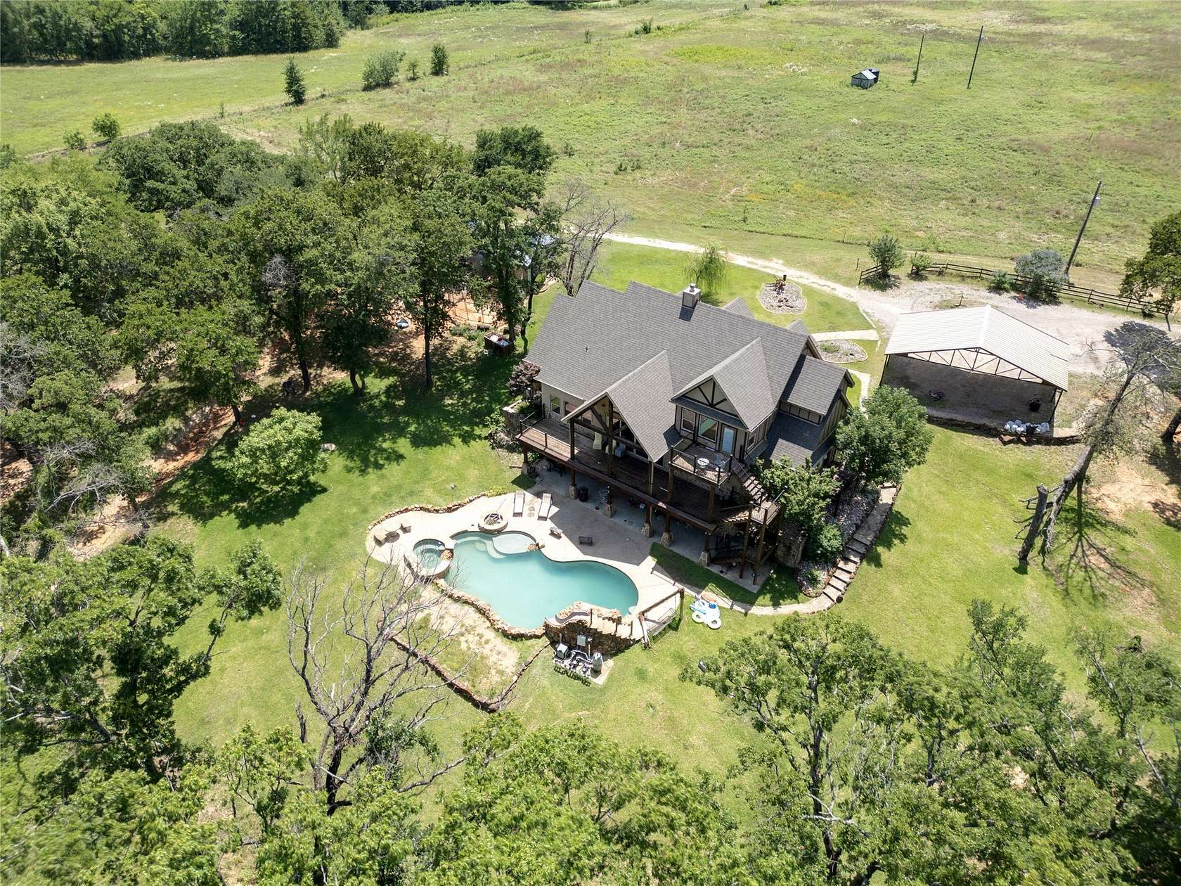 62 Acres of Recreational Land with Home for Sale in Whitesboro, Texas
