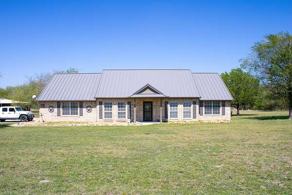 2 Acres of Land with Home for Lease in Rhome, Texas